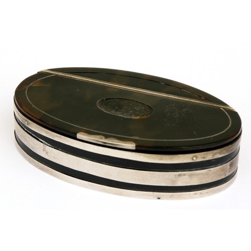 79 - A Georgian tortoiseshell and white metal banded oval snuff box. 10cm (4 ins) wide