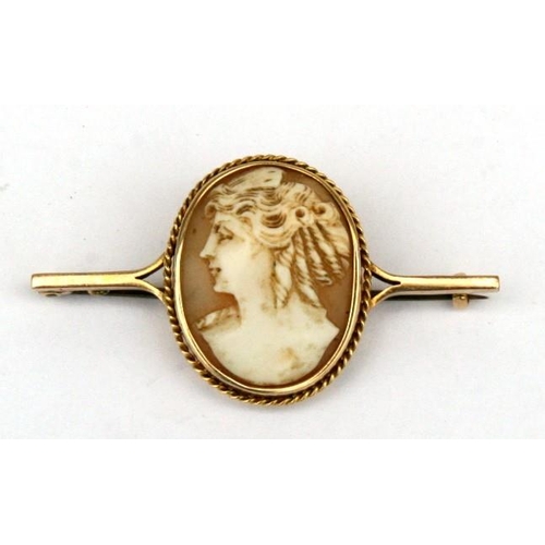 90 - A yellow metal (tests as gold) cameo bar brooch, the cameo 28mm high.