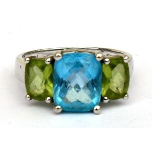 96 - A 14ct white gold topaz and peridot ring. Approx UK size N