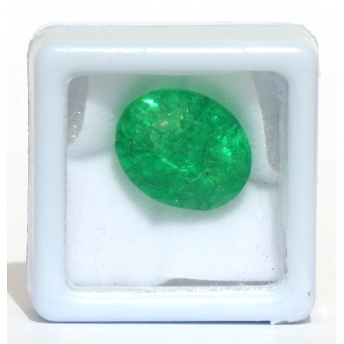 109 - A natural emerald loose gemstone with GGL certificate report stating the emerald to be 11.70cts, ova... 