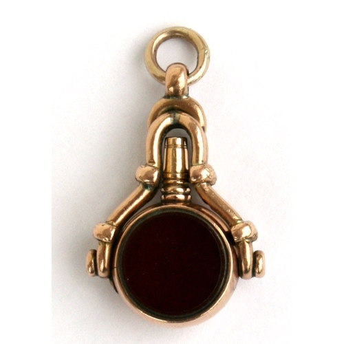 118 - A Victorian 10ct rose gold blood stone and carnelian set pocket watch fob with swivel action pocket ... 