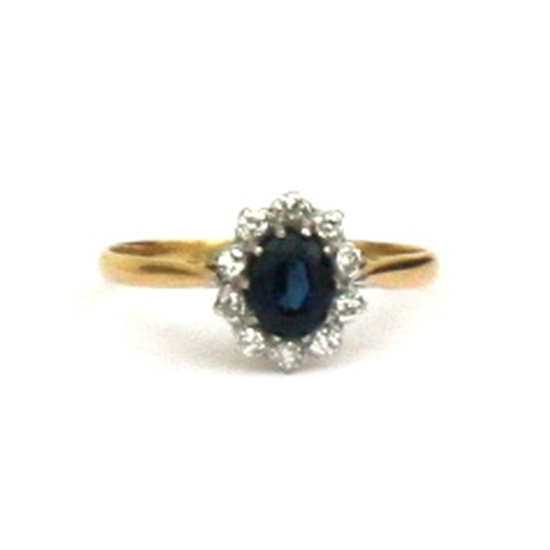 120 - An 18ct gold diamond and sapphire ring Approx UK size P