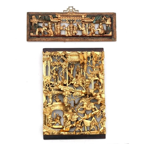 442 - A large Chinese pierced giltwood temple panel decorated with warriors in a landscape, 30 by 46cms (1... 