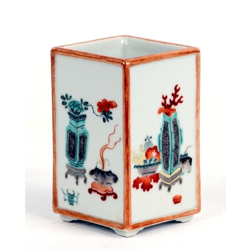 445 - A Chinese square form brush pot decorated with precious objects, ten character mark to the underside... 
