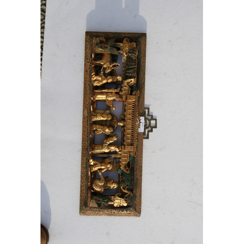 442 - A large Chinese pierced giltwood temple panel decorated with warriors in a landscape, 30 by 46cms (1... 