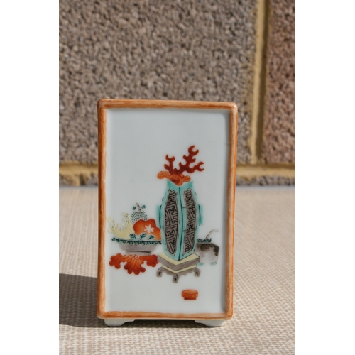 445 - A Chinese square form brush pot decorated with precious objects, ten character mark to the underside... 