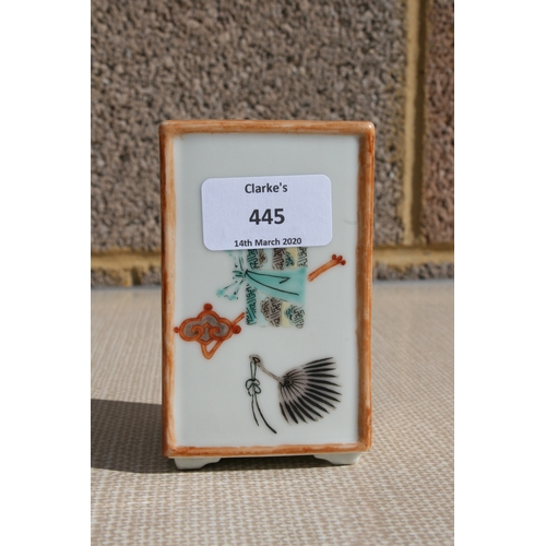 445 - A Chinese square form brush pot decorated with precious objects, ten character mark to the underside... 