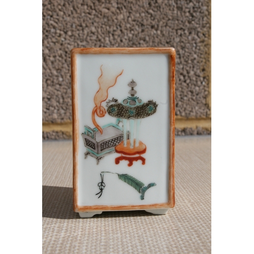 445 - A Chinese square form brush pot decorated with precious objects, ten character mark to the underside... 