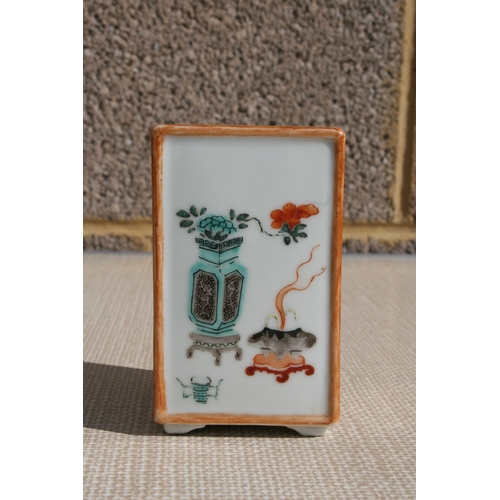 445 - A Chinese square form brush pot decorated with precious objects, ten character mark to the underside... 