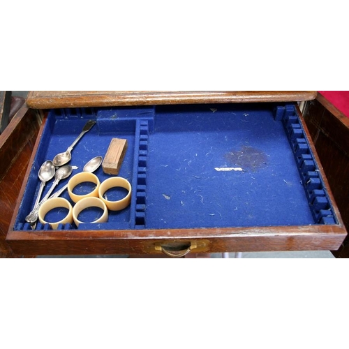 112 - A quantity of Victorian of silver cutlery in an oak canteen. Various London date marks. 121 troy oun... 