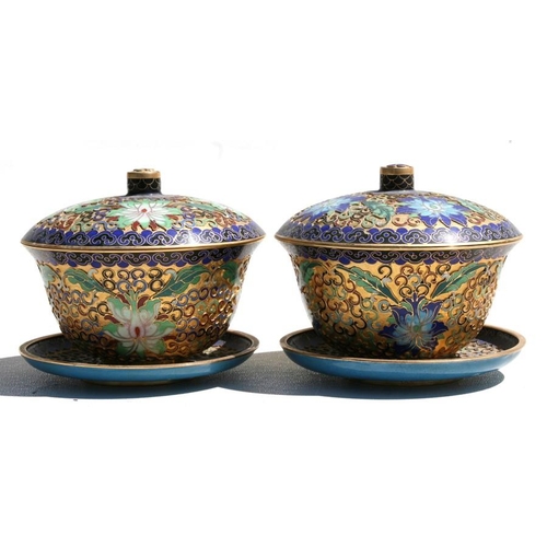 318 - A pair of Chinese gilt metal and enamel bowls, cover and stands, 13cm (5ins) diameter.