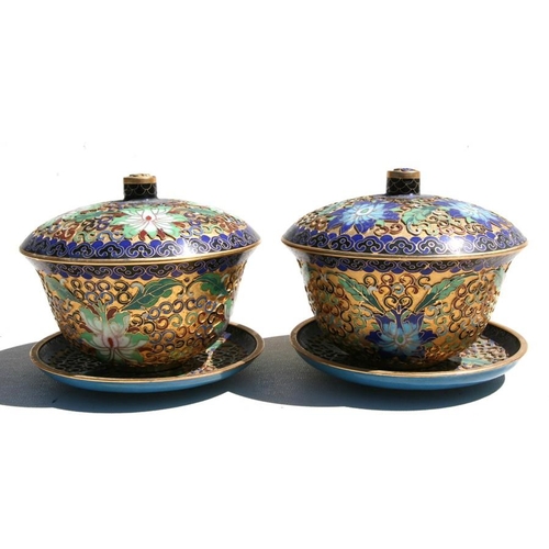 318 - A pair of Chinese gilt metal and enamel bowls, cover and stands, 13cm (5ins) diameter.