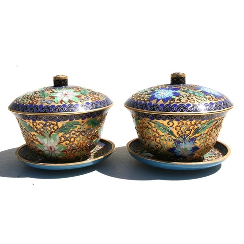 318 - A pair of Chinese gilt metal and enamel bowls, cover and stands, 13cm (5ins) diameter.