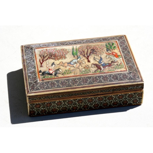 321 - An Indian box, the top decorated with  a hunting scene within a sadeli micro mosaic border, 13cm (5i... 