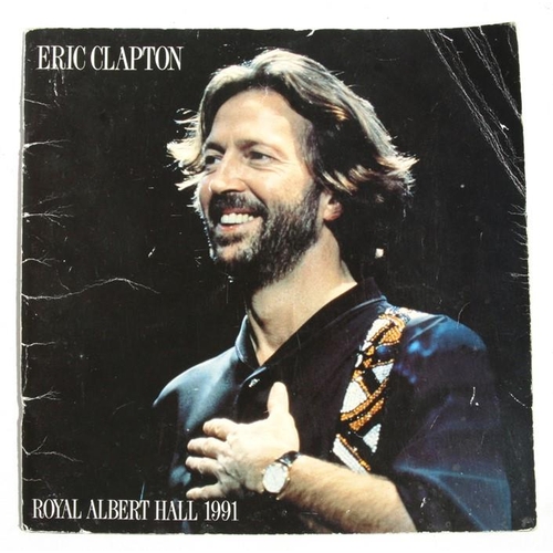 77 - ERIC CLAPTON.  A Royal Albert Hall 1991 programme signed by Eric Clapton and members of his band and... 