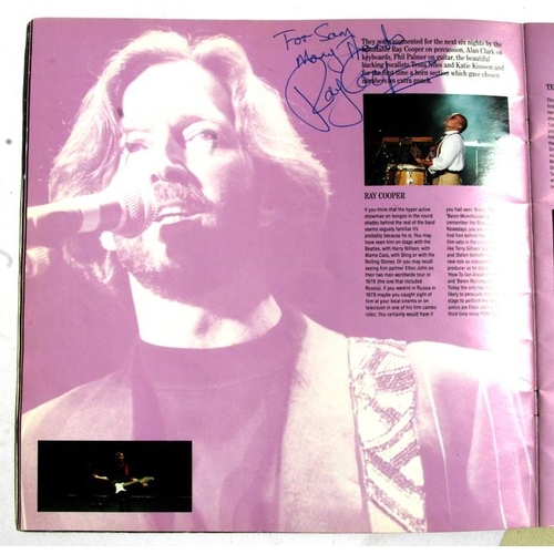 77 - ERIC CLAPTON.  A Royal Albert Hall 1991 programme signed by Eric Clapton and members of his band and... 