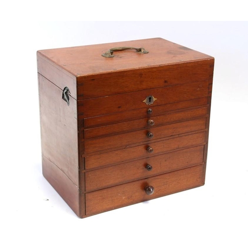 118 - A late 19th / early 20th century mahogany dentist's cabinet with lift up lid containing a sectioned ... 