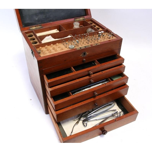 118 - A late 19th / early 20th century mahogany dentist's cabinet with lift up lid containing a sectioned ... 