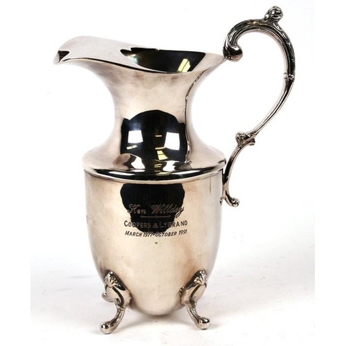 152 - An Arts & Crafts period plated spirit kettle on stand; together with a silver plated wine jug (2... 