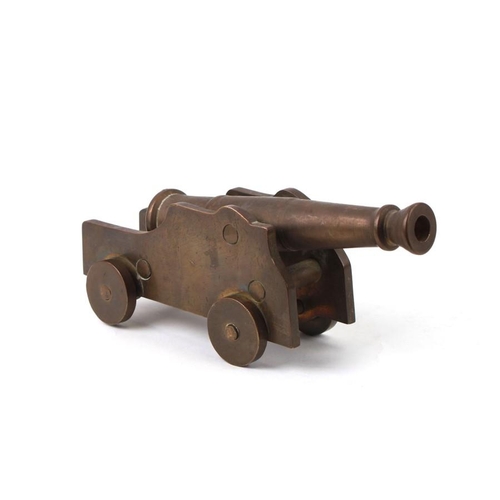 261 - A 20th century signal cannon, having a brass barrel 16.5cms (6.5ins) long with an approximate bore d... 