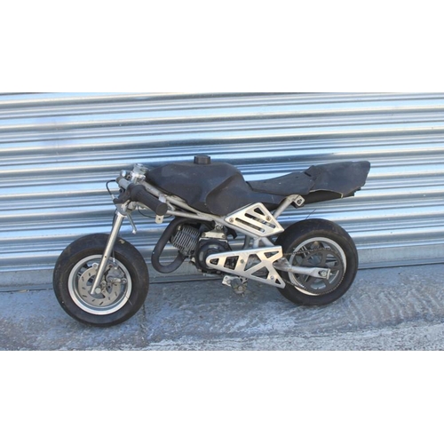 27 - A Mini Moto motorcycle.