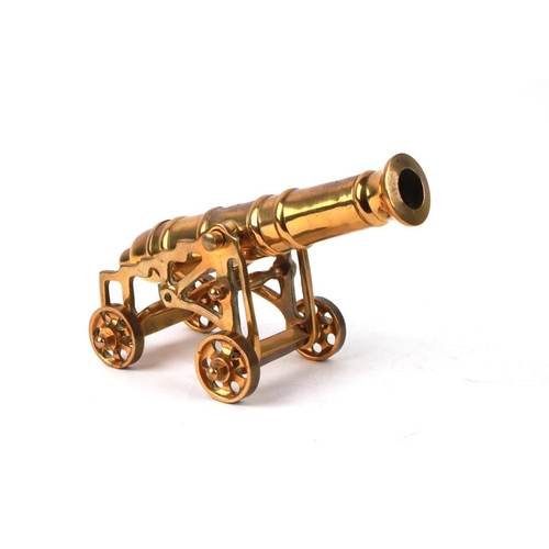 280 - A 20th century brass barrelled Signal Cannon mounted on a brass carriage and wheels. Barrel length 2... 