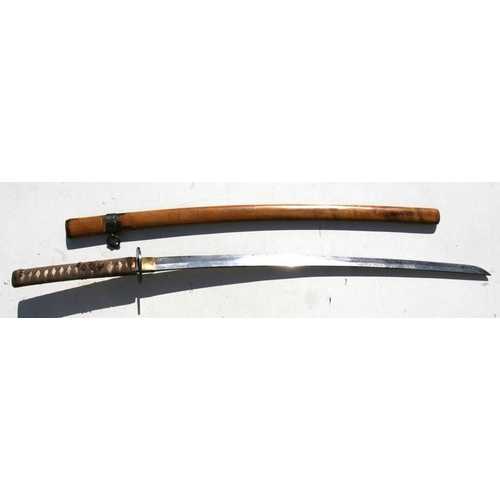 309 - A Japanese WWII kutana with plain cast tsuba, housed in a wooden scabbard, 99cm (39ins) long.