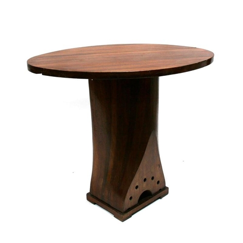 311 - An unusual occasional table made from a laminated mahogany propeller, 90cm (35.5ins ) wide.