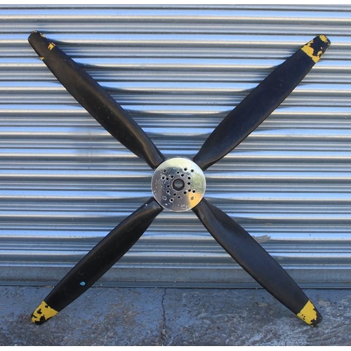 312 - A four bladed aeroplane propeller, 127cm (50ins) wide