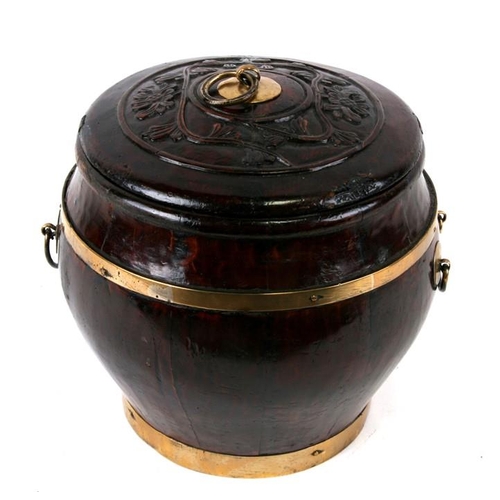 314 - A lacquered wooden brass bound food container, 21cms (8.25ins) high.