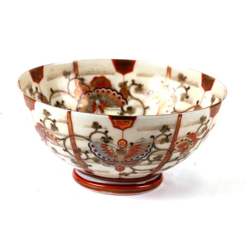 315 - A Japanese Kutani bowl decorated with butterflies and foliate scrolls, 15cms (6ins) wide.