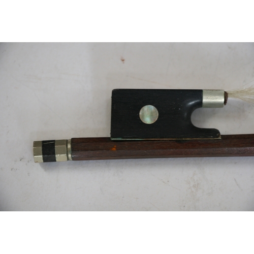 113 - A two-piece backed violin and bow, 60cm (23.5ins) long.