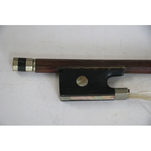 113 - A two-piece backed violin and bow, 60cm (23.5ins) long.