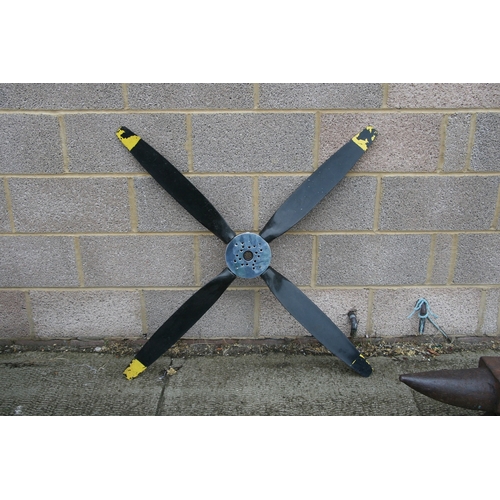 312 - A four bladed aeroplane propeller, 127cm (50ins) wide