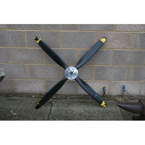 312 - A four bladed aeroplane propeller, 127cm (50ins) wide