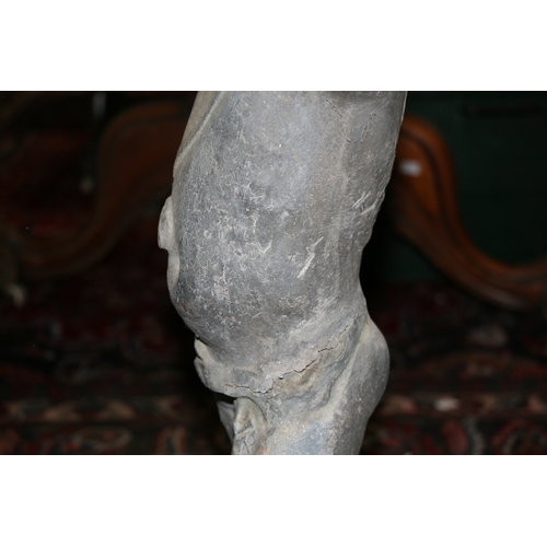 23 - A lead birdbath in the form of a cherub, 70cms (27.5ins) high.