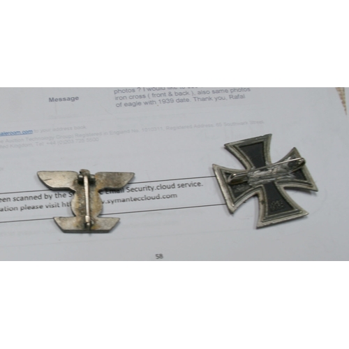 221 - A quantity of WWII badges to include the Iron Cross.