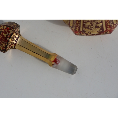 35 - A fine quality 19th century Bohemian cranberry glass scent bottle with gilded overlay decoration, 20... 