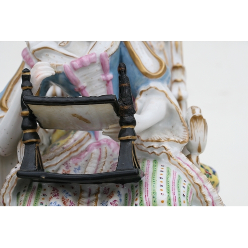 69 - A Meissen figure depicting a seated lady with her needlework, 24cm (9.5ins) high