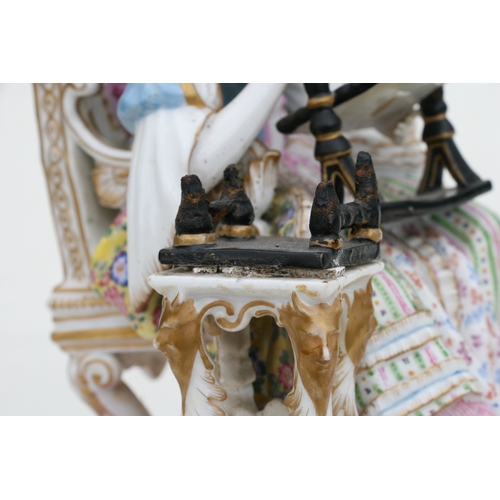 69 - A Meissen figure depicting a seated lady with her needlework, 24cm (9.5ins) high