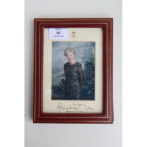 80 - A signed photograph of Princess Alexandra of Kent, in a Smythson of Bond Street red leather strut fr... 