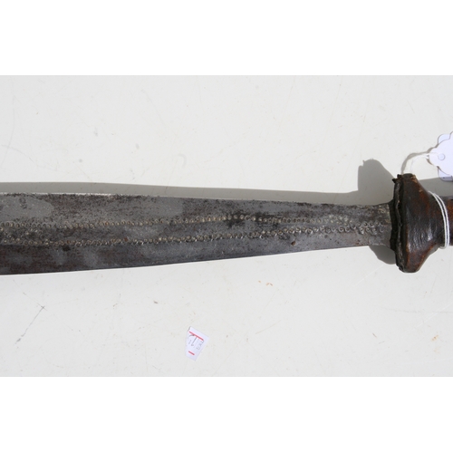 233 - A Congolese Yaka long knife having a shaped leather hilt with wire cage to the centre and a flat iro... 