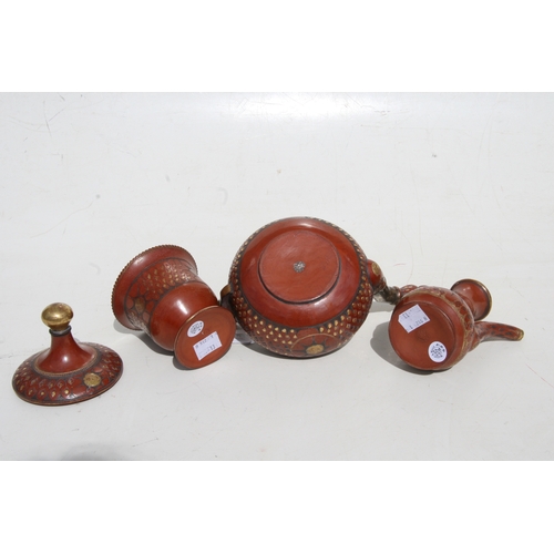 324 - A 19th century Turkish Tophane pottery part tea or coffee service with impressed gilded leaf and sun... 