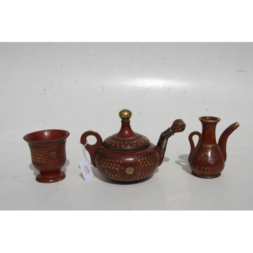 324 - A 19th century Turkish Tophane pottery part tea or coffee service with impressed gilded leaf and sun... 