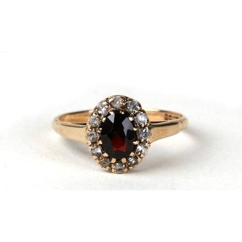 1020 - A 9ct gold garnet cluster ring Approx UK size R. 2.2g