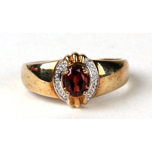 1025 - A 9ct gold garnet ring. Approx UK size P. 3.3g