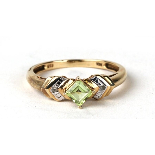 1026 - A 9ct gold peridot and diamond ring. Approx UK size N. 1.8g