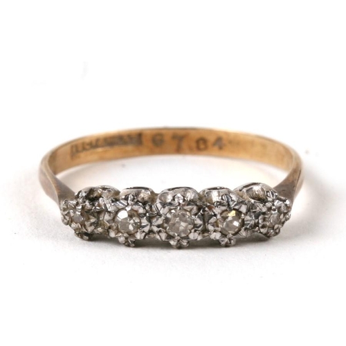 1035 - An 18ct gold five stone diamond ring. Approx. UK size P  2.2g