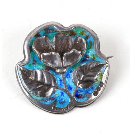 1036 - An Art Nouveau silver and enamel flower brooch, Chester 1908