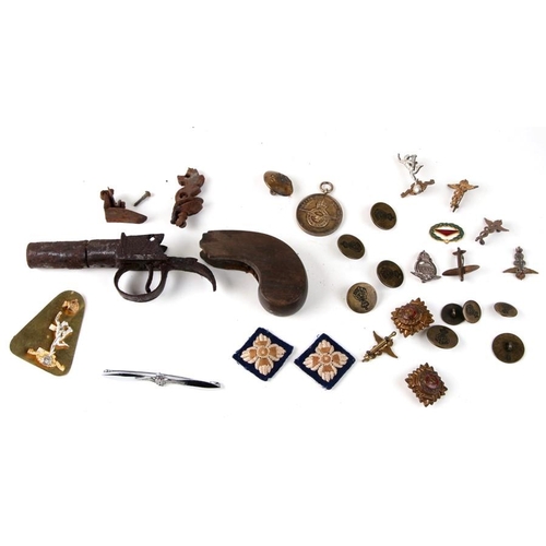 1053 - A Georgian period Muff pistol (a/f); together with RAF and other military badges and buttons.